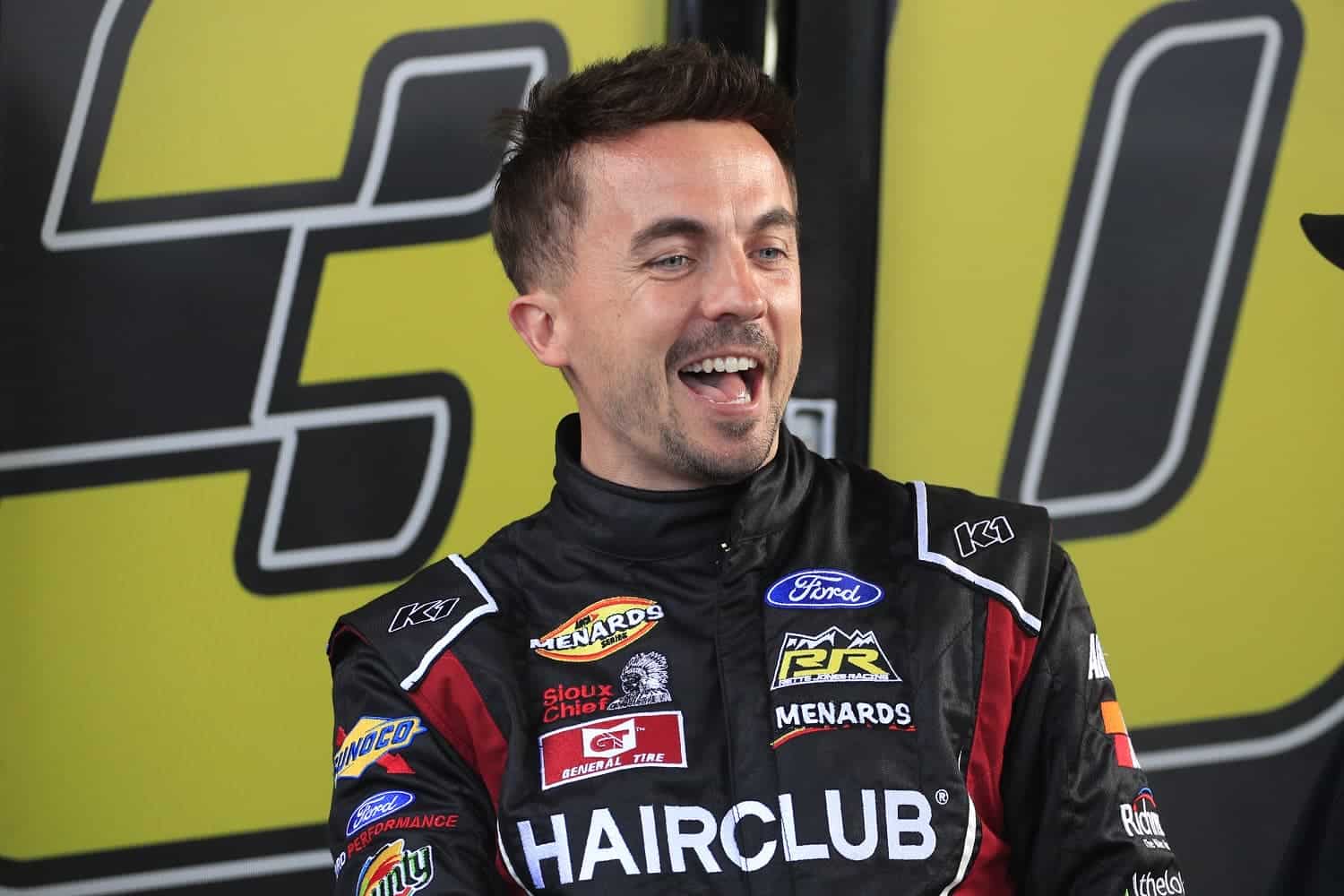 Frankie Muniz enjoys a laugh during practice for the ARCA Series Brandt 200 on Feb. 16, 2023 in Daytona Beach, Florida.