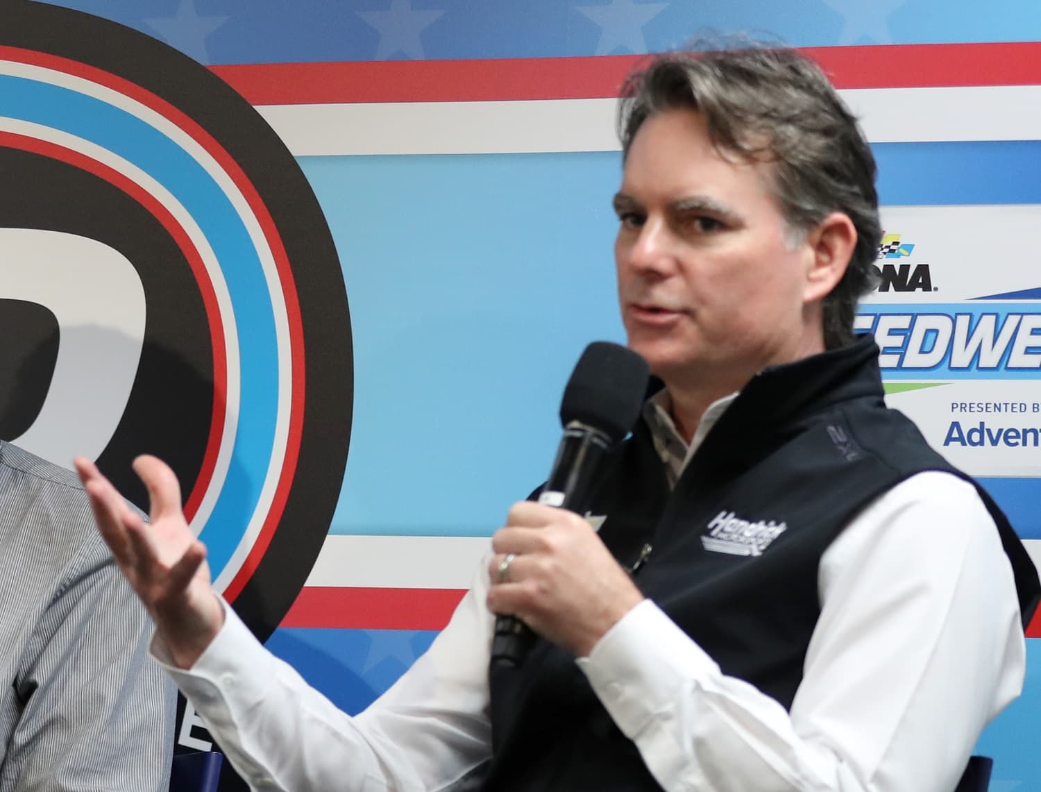 NASCAR Hall of Fame driver Jeff Gordon speak to the media during a press conference prior to the NASCAR Cup Series Daytona 500 on Feb. 19, 2023.