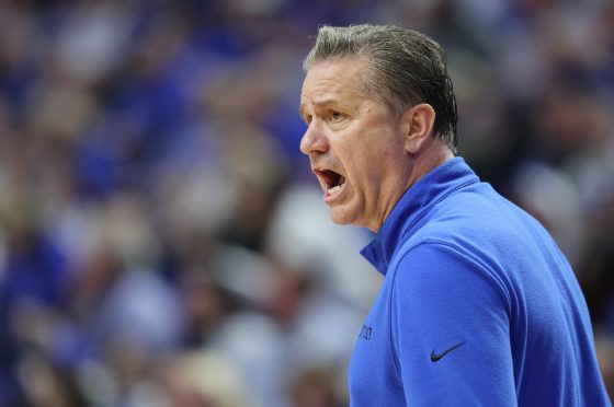 John Calipari yells on the sideline.
