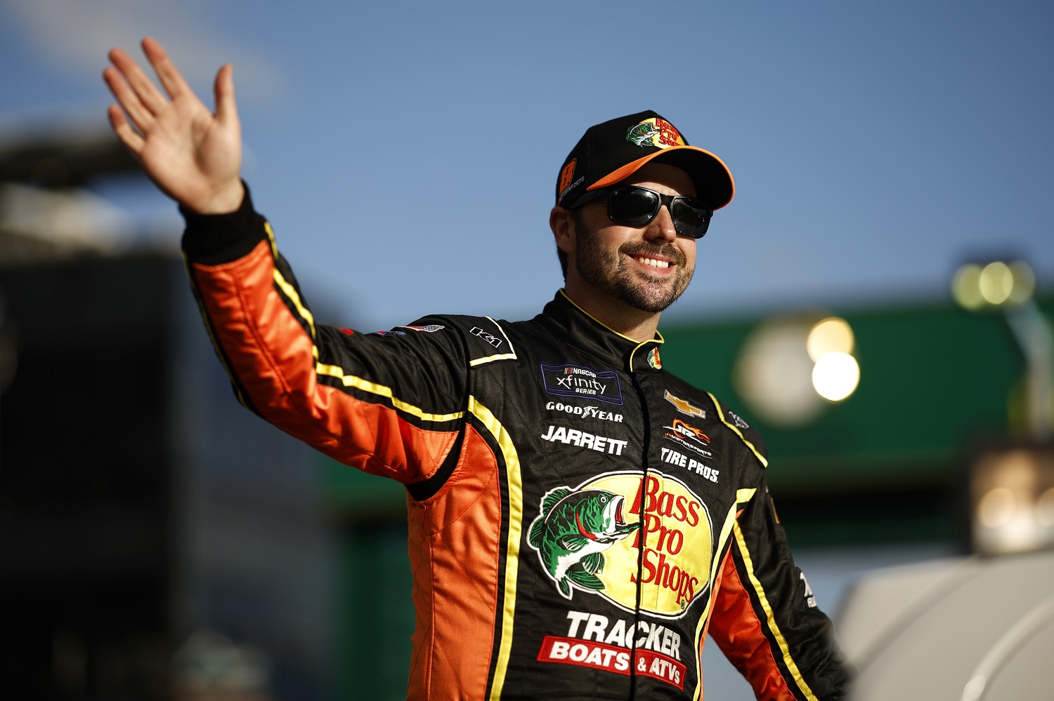 Josh Berry waves to fans during the parade lap before the NASCAR Xfinity Series race at Daytona International Speedway on Feb. 18, 2023.