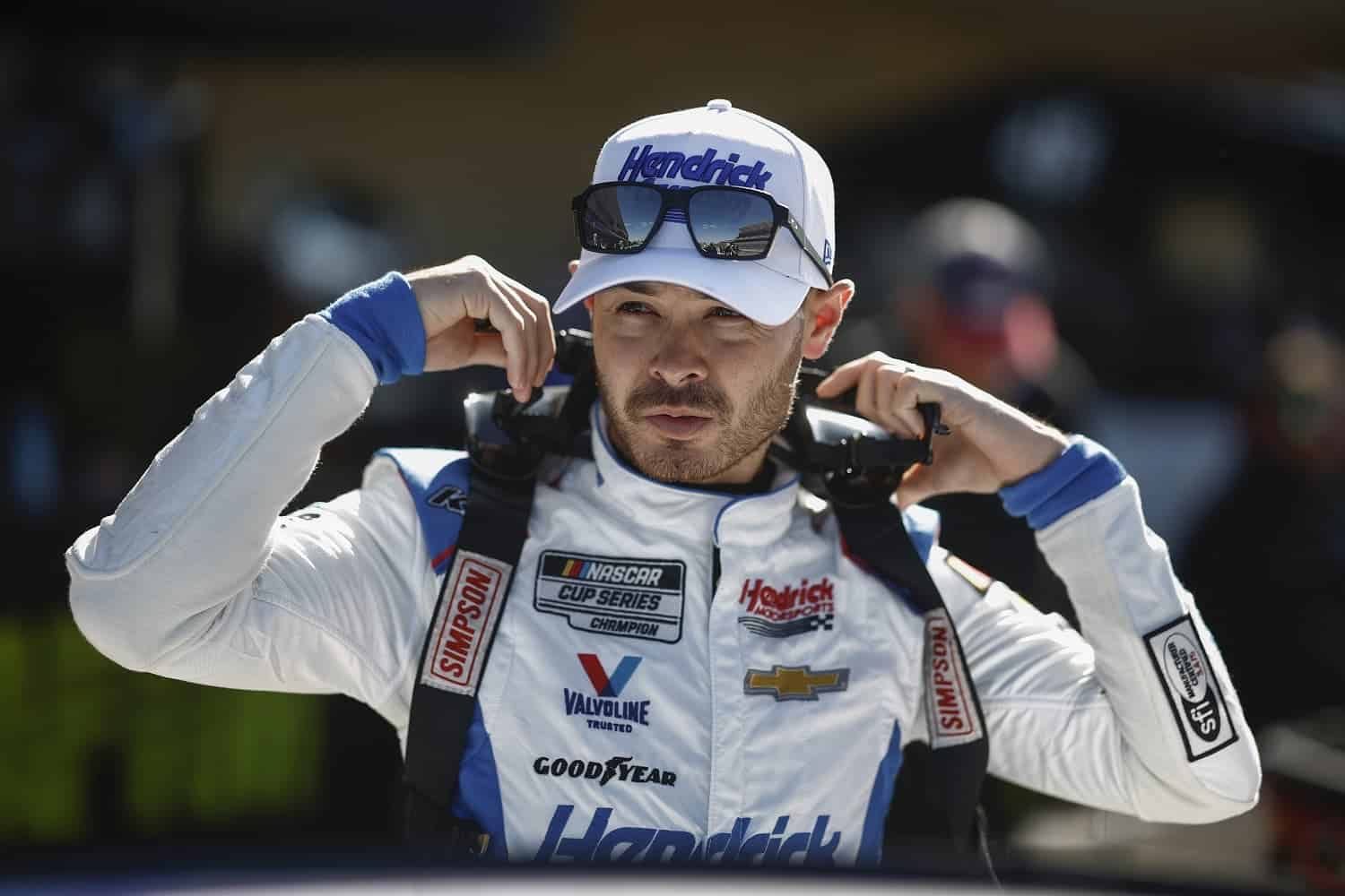 Kyle Larson prepares in the garage area during qualifying for the NASCAR Cup Series EchoPark Automotive Grand Prix at Circuit of The Americas on March 25, 2023.