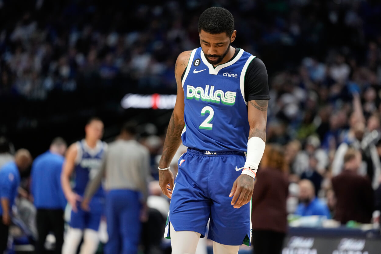 Kyrie Irving of the Dallas Mavericks walks up the court.