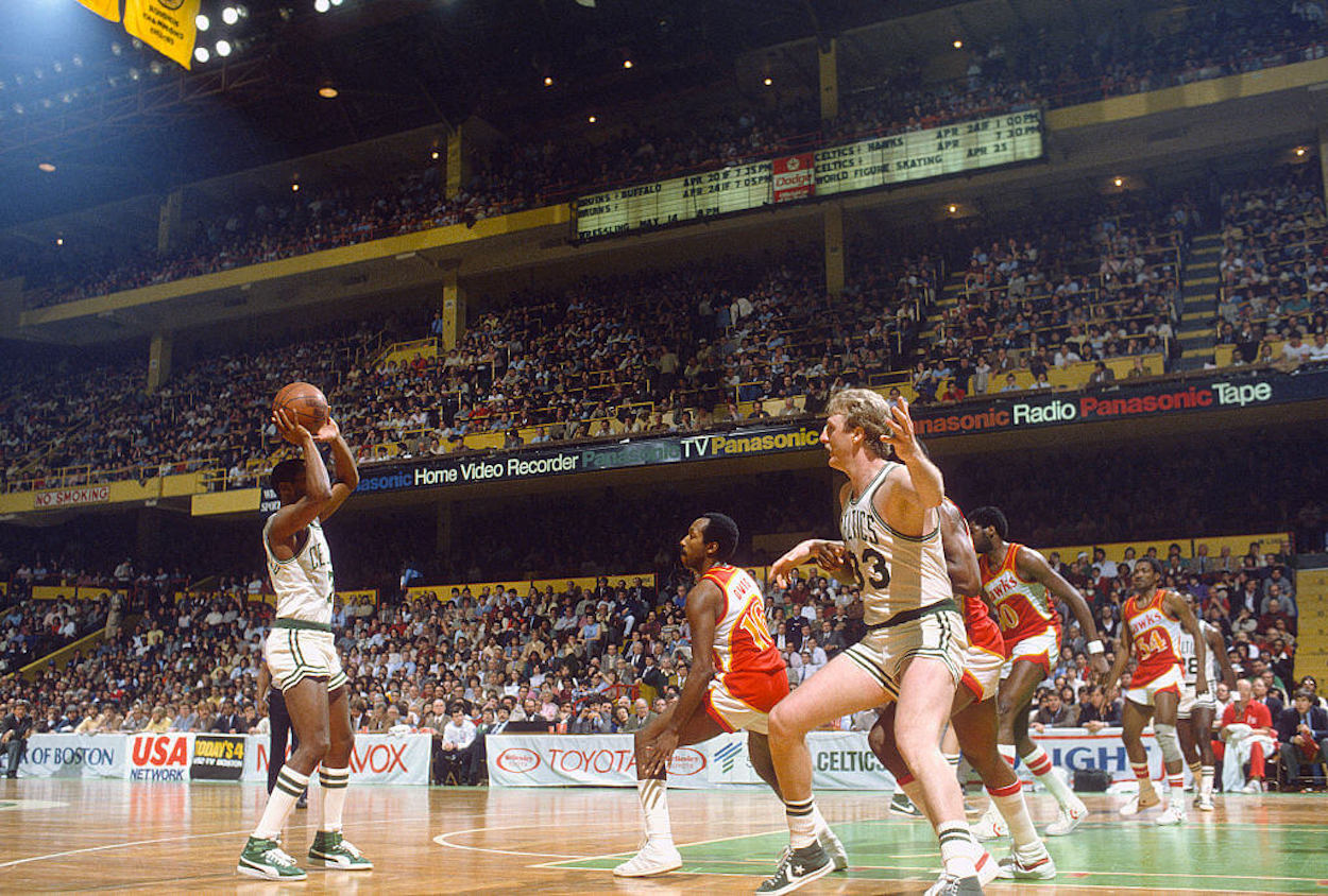 Nate Archibald (L) and Larry Bird (R) during a Boston Celtics game.