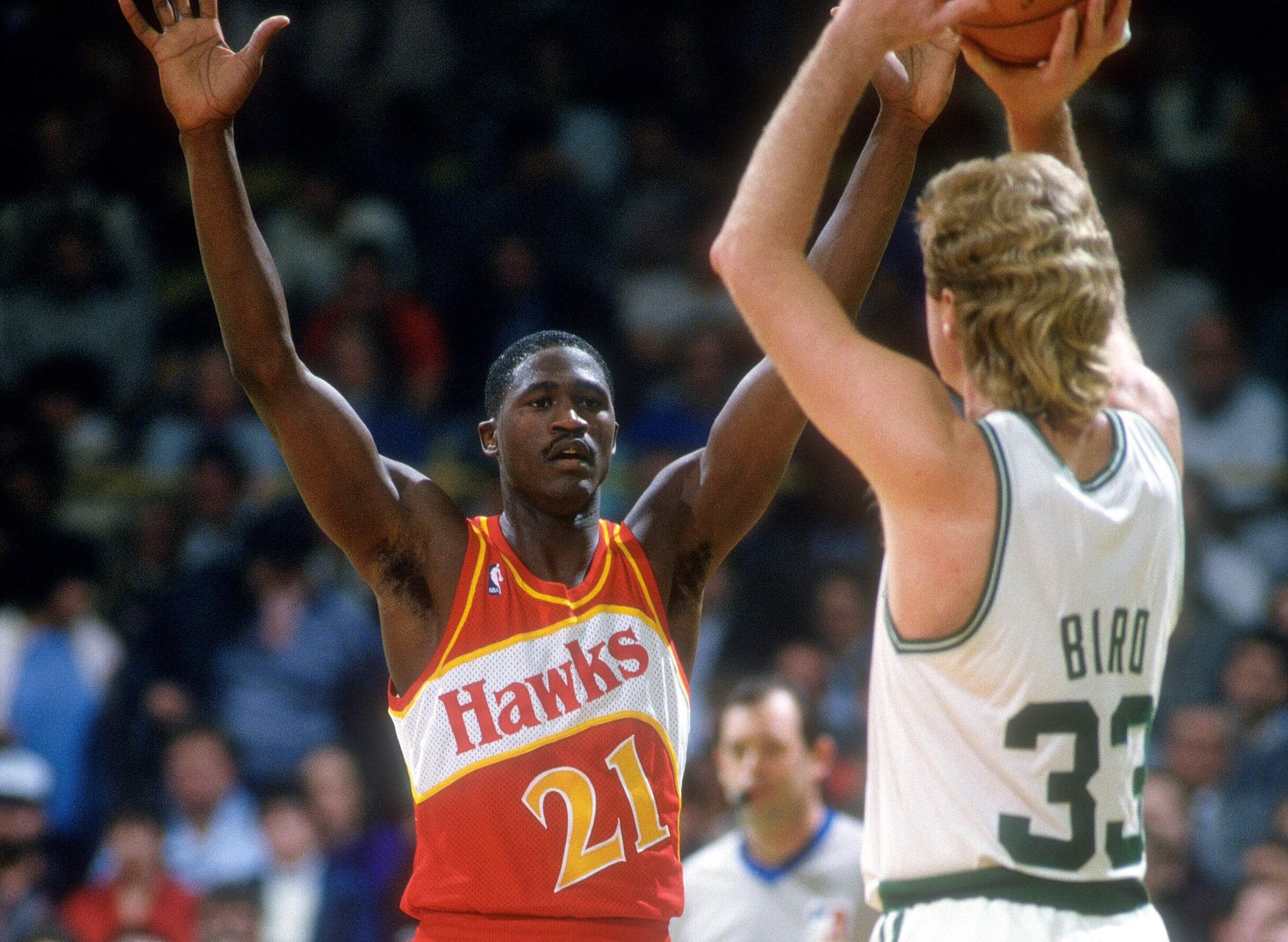 Dominique Wilkins of the Atlanta Hawks defends Larry Bird of the Boston Celtics.