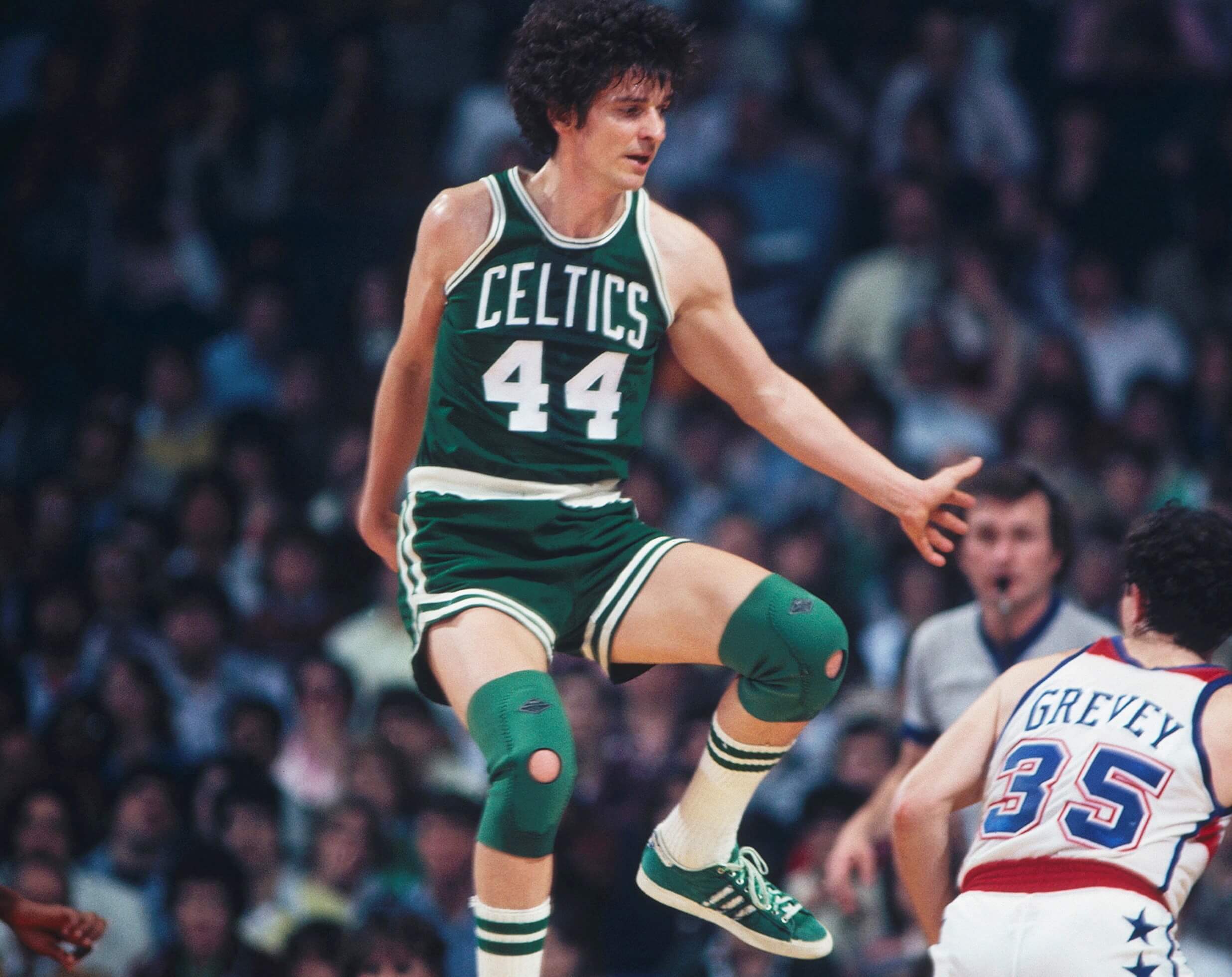 Boston Celtics guard Pete Maravich jumps on the court