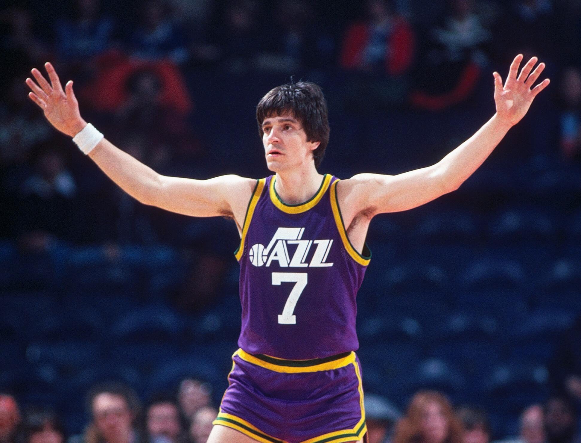 Utah Jazz guard Pete Maravich looks to receive a pass