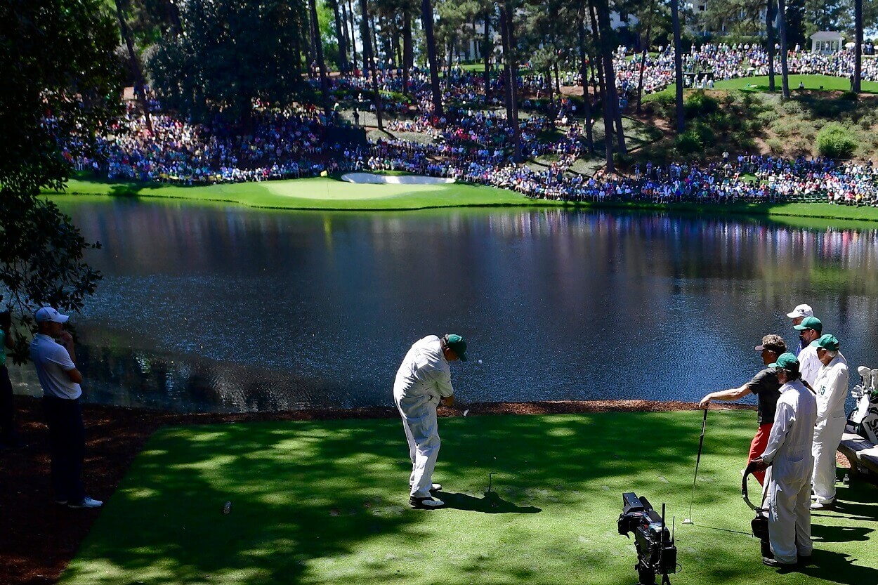 Larry Mize tees off during the Par 3 Contest at The Masters in 2019