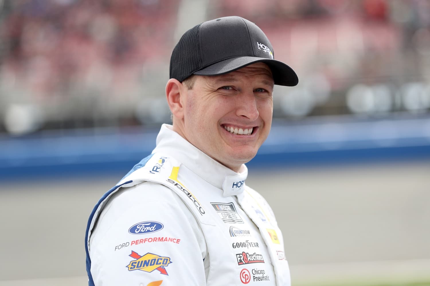 Michael McDowell waits on the grid prior to the NASCAR Cup Series Pala Casino 400 at Auto Club Speedway on Feb. 26, 2023.