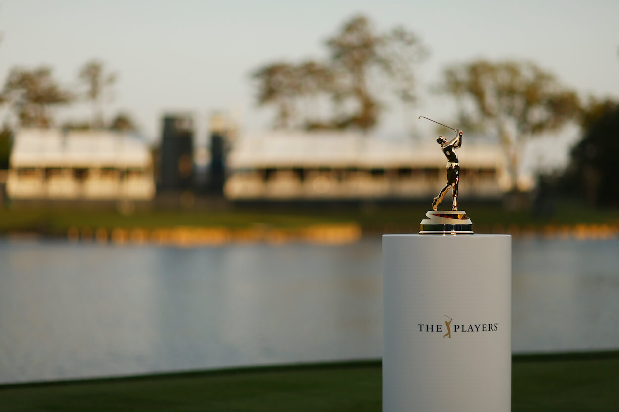 The Players Championship trophy is shown.