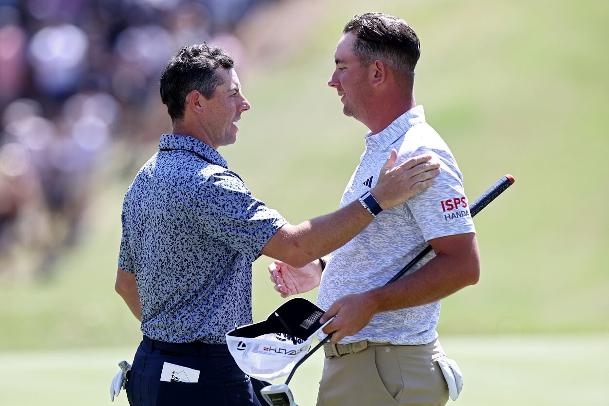 Rory McIlroy and Lucas Herbert following their Round of 16 matchup at the WGC-Match Play