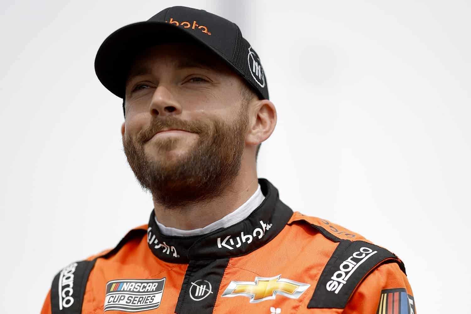 Ross Chastain walks the grid during qualifying for the NASCAR Cup Series United Rentals Work United 500 at Phoenix Raceway on March 11, 2023.