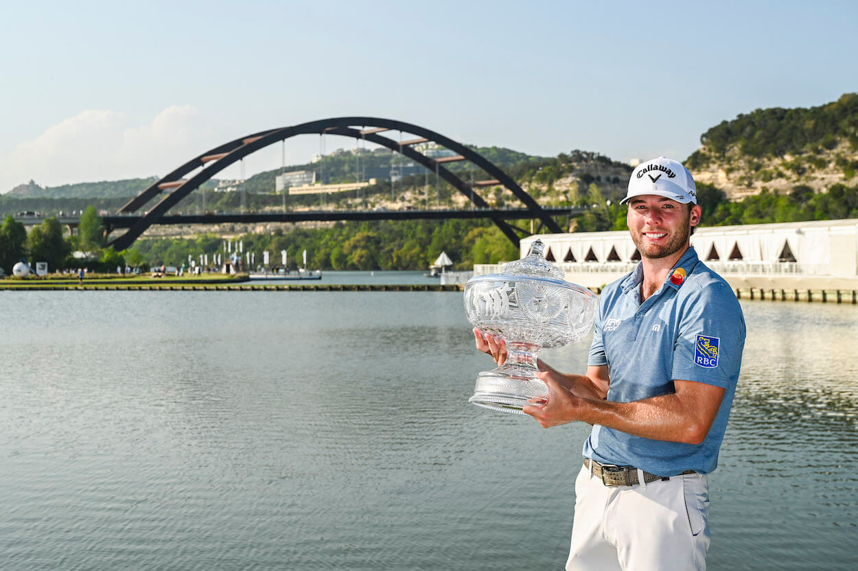 Sam Burns poses with the trophy after winning the WGC Match Play.
