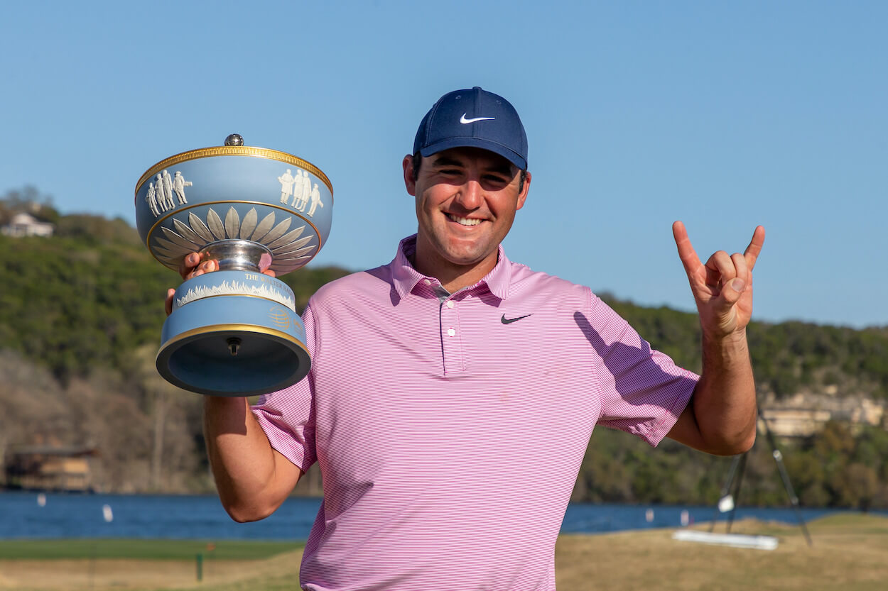 Scottie Scheffler poses with the trophy after winning the WGC-Match Play.