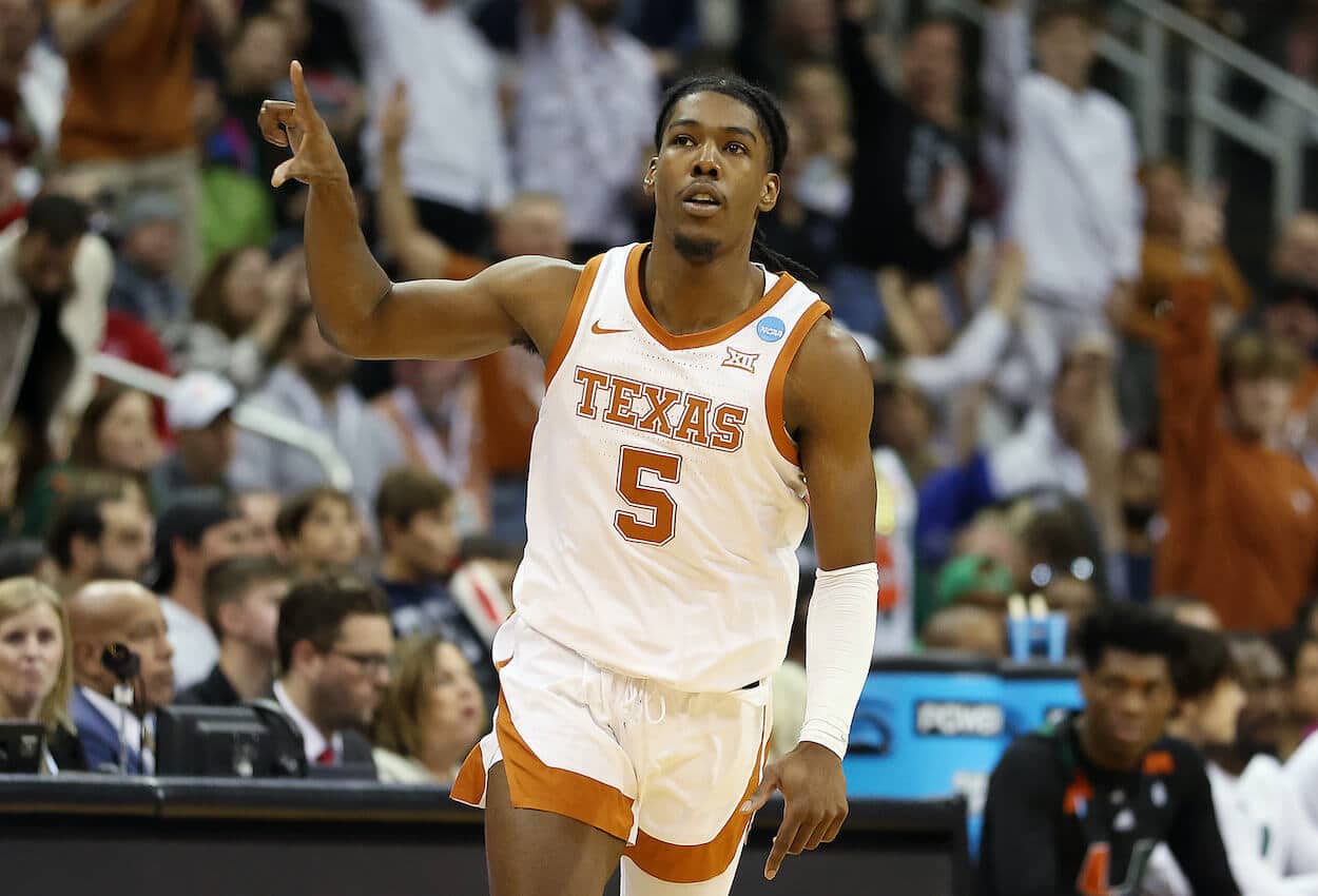 Marcus Carr of Texas celebrates against Miami.