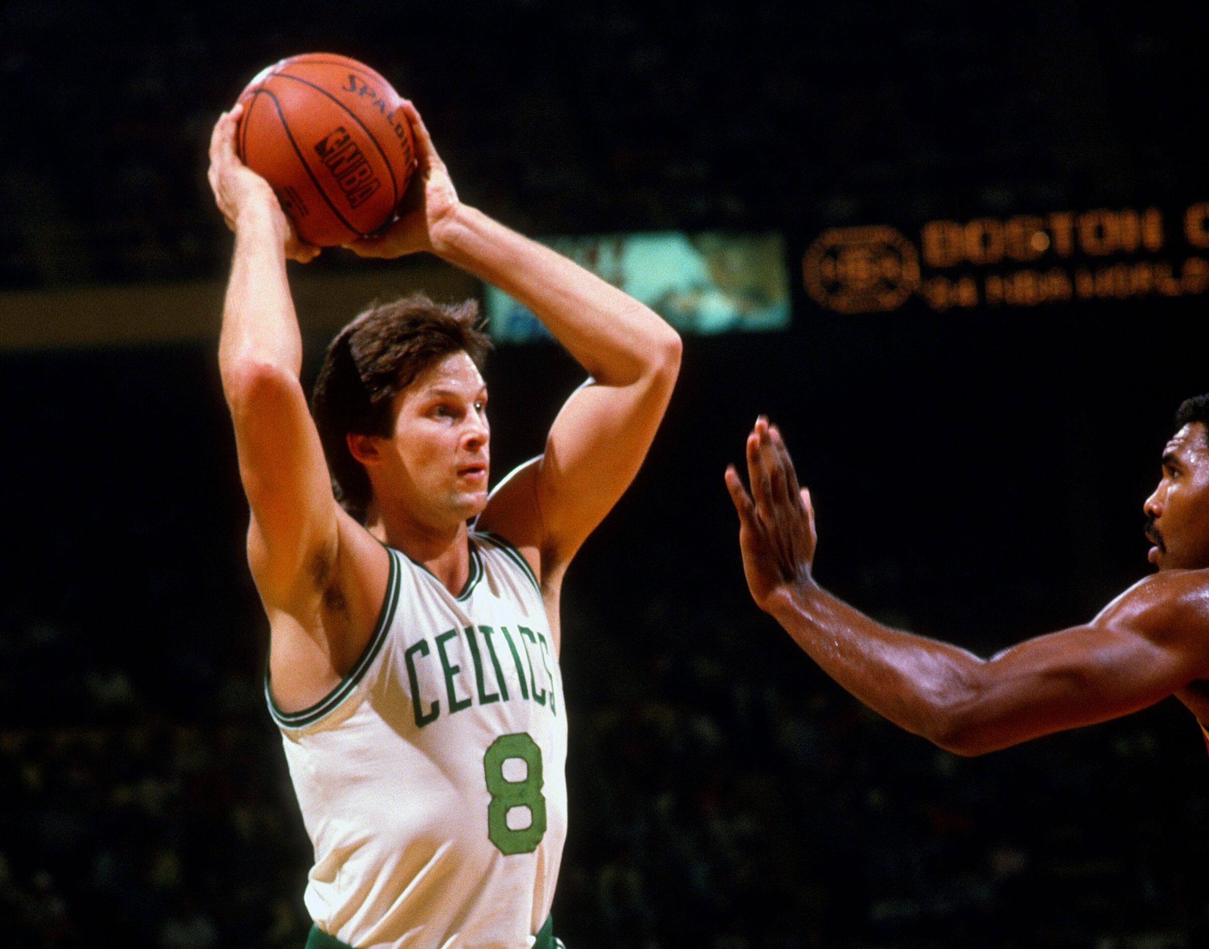 Scott Wedman of the Boston Celtics looks to pass the ball.