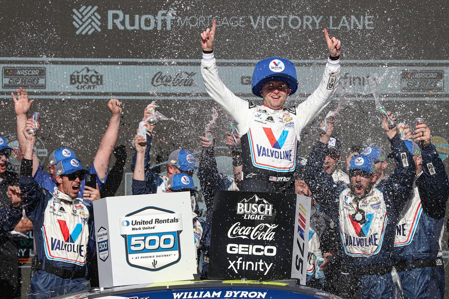 William Byron celebrates in Victory Lane after winning the NASCAR Cup Series United Rentals Work United 500 at Phoenix Raceway on March 12, 2023.