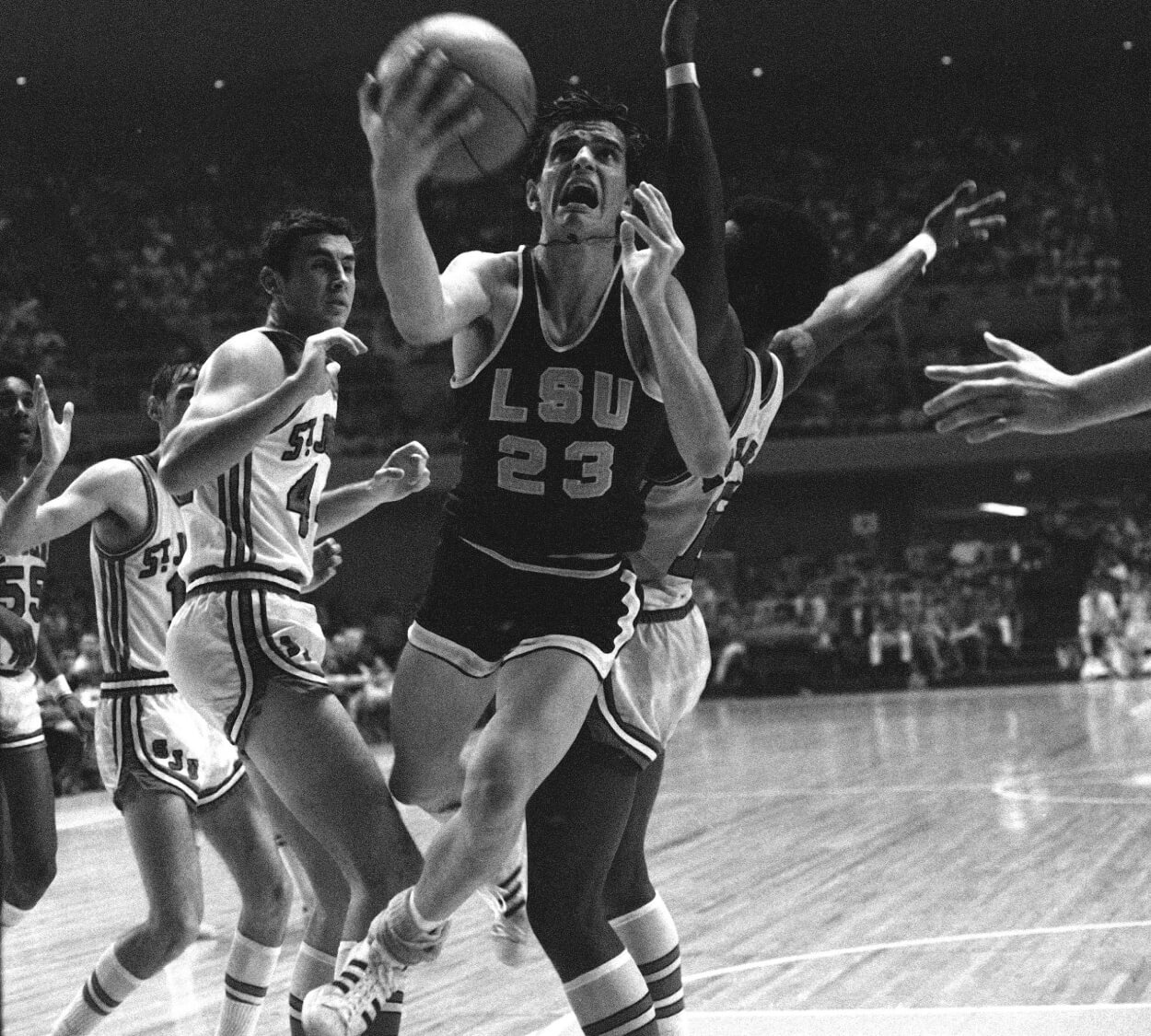 Pete Maravich of the Louisiana State Tigers goes in for a layup.