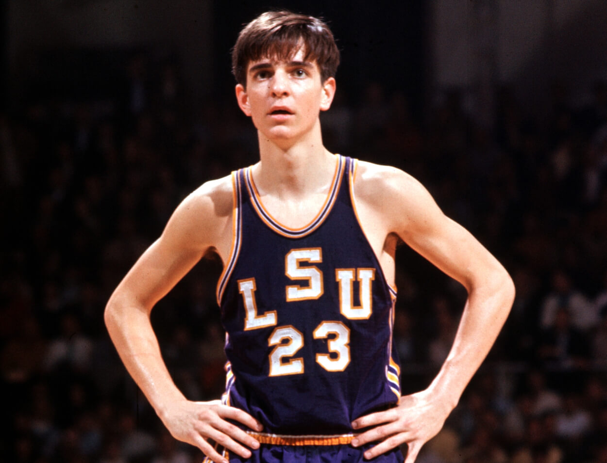 Pete Maravich of the LSU Tigers stands on the court.