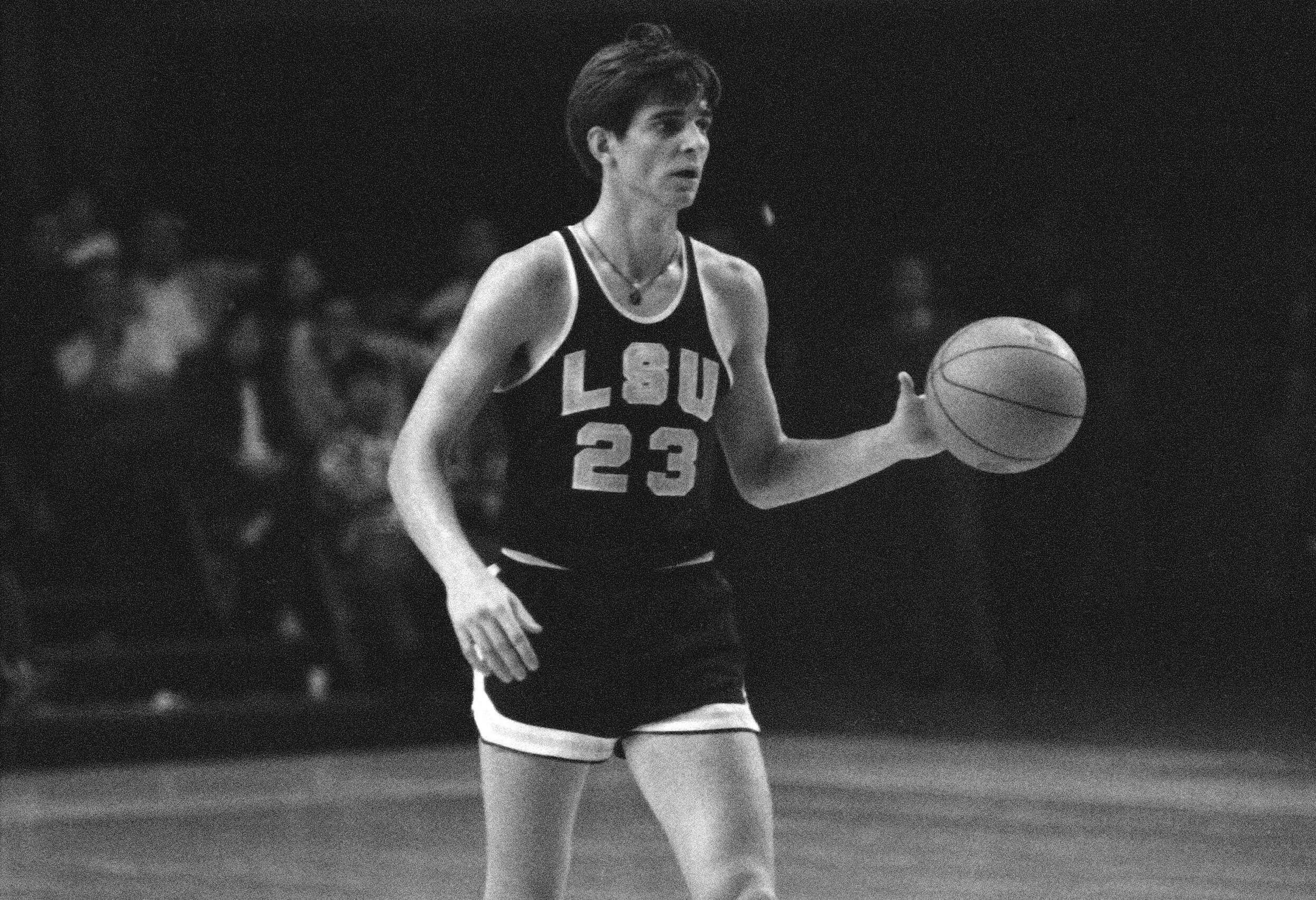 Pete Maravich of the Louisiana State Tigers dribbles the ball.