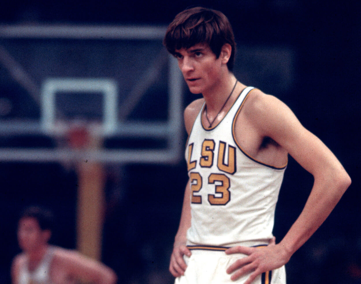 Pete Maravich of the LSU Tigers stands on the court.