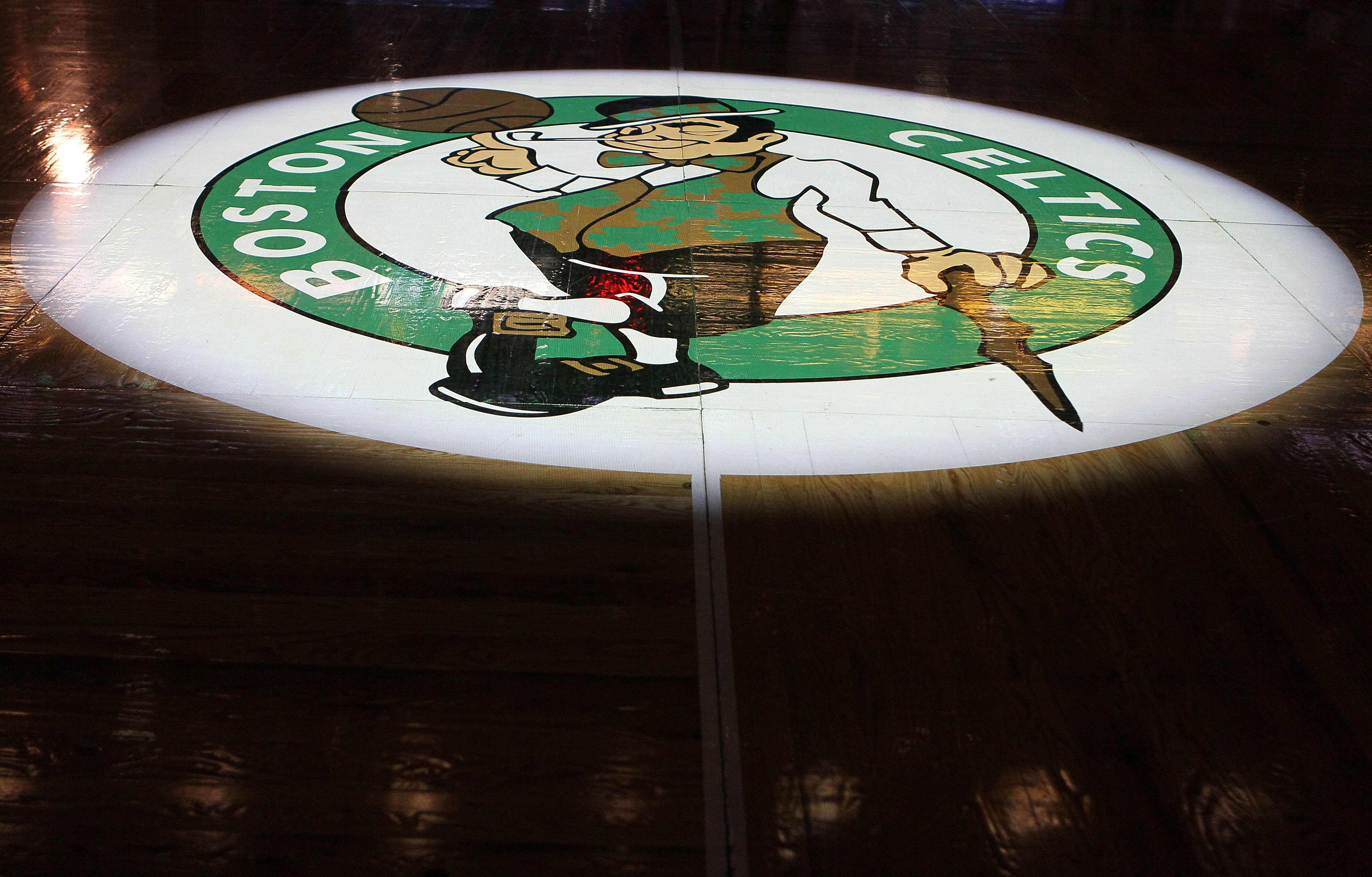 A detail of the Boston Celtics logo is seen on the court