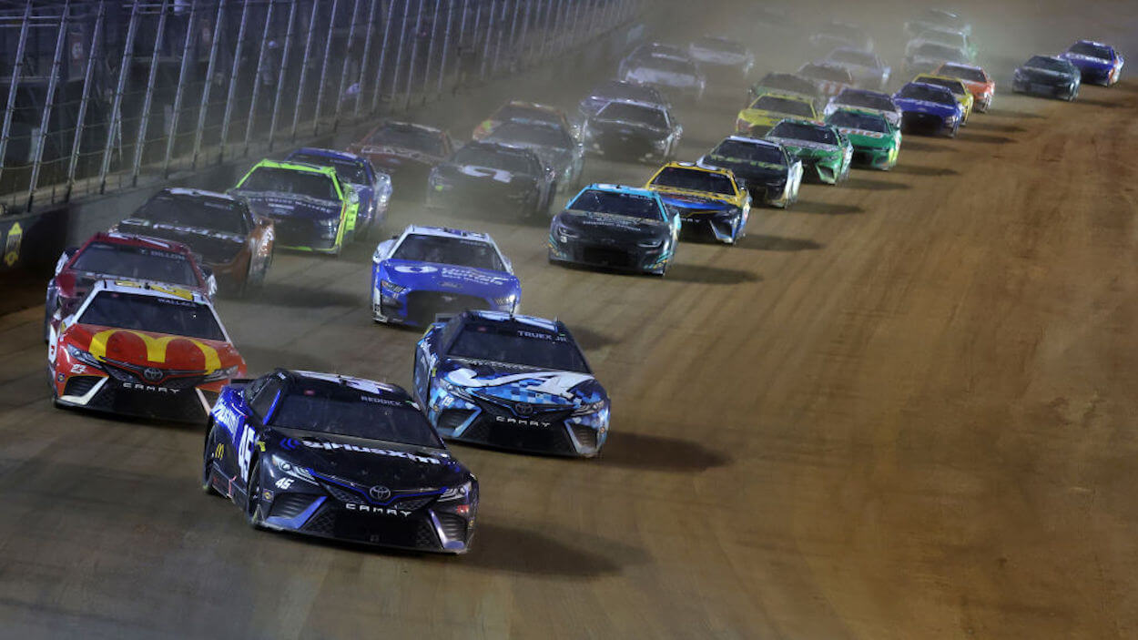 The pack of drivers during the 2023 NASCAR Cup Series Food City Dirt Race at Bristol Motor Speedway.