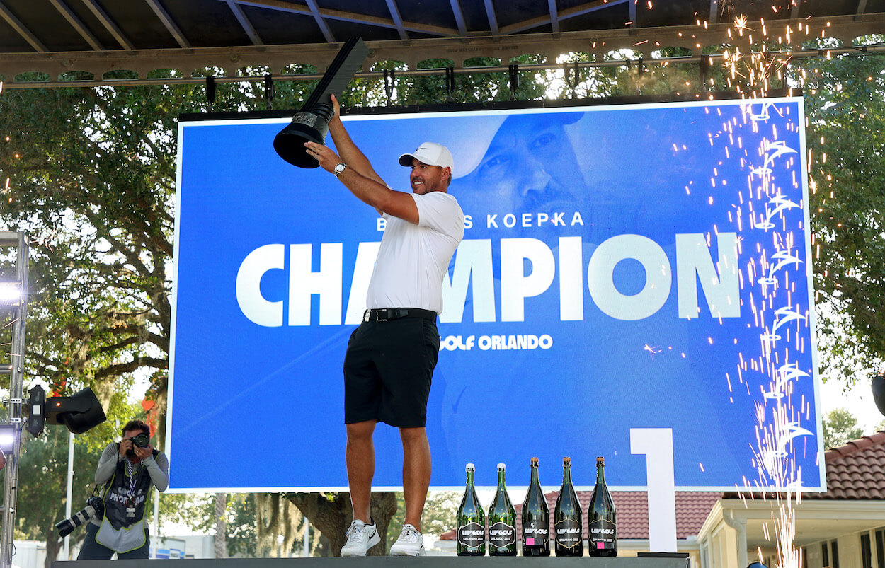 Brooks Koepka celebrates after winning the LIV Golf event in Orlando.