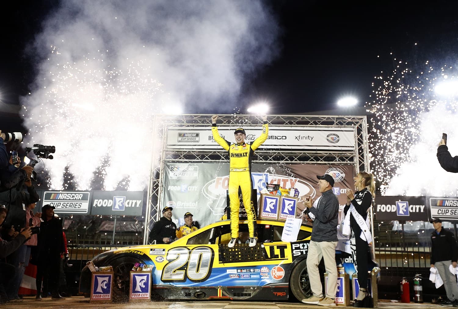 Christopher Bell, celebrates in Victory Lane after winning the NASCAR Cup Series Food City Dirt Race at Bristol Motor Speedway on April 9, 2023. | Jared C. Tilton/Getty Images