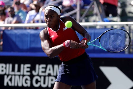 Coco Gauff returns a shot during a 2023 Billie Jean King Cup qualifier.