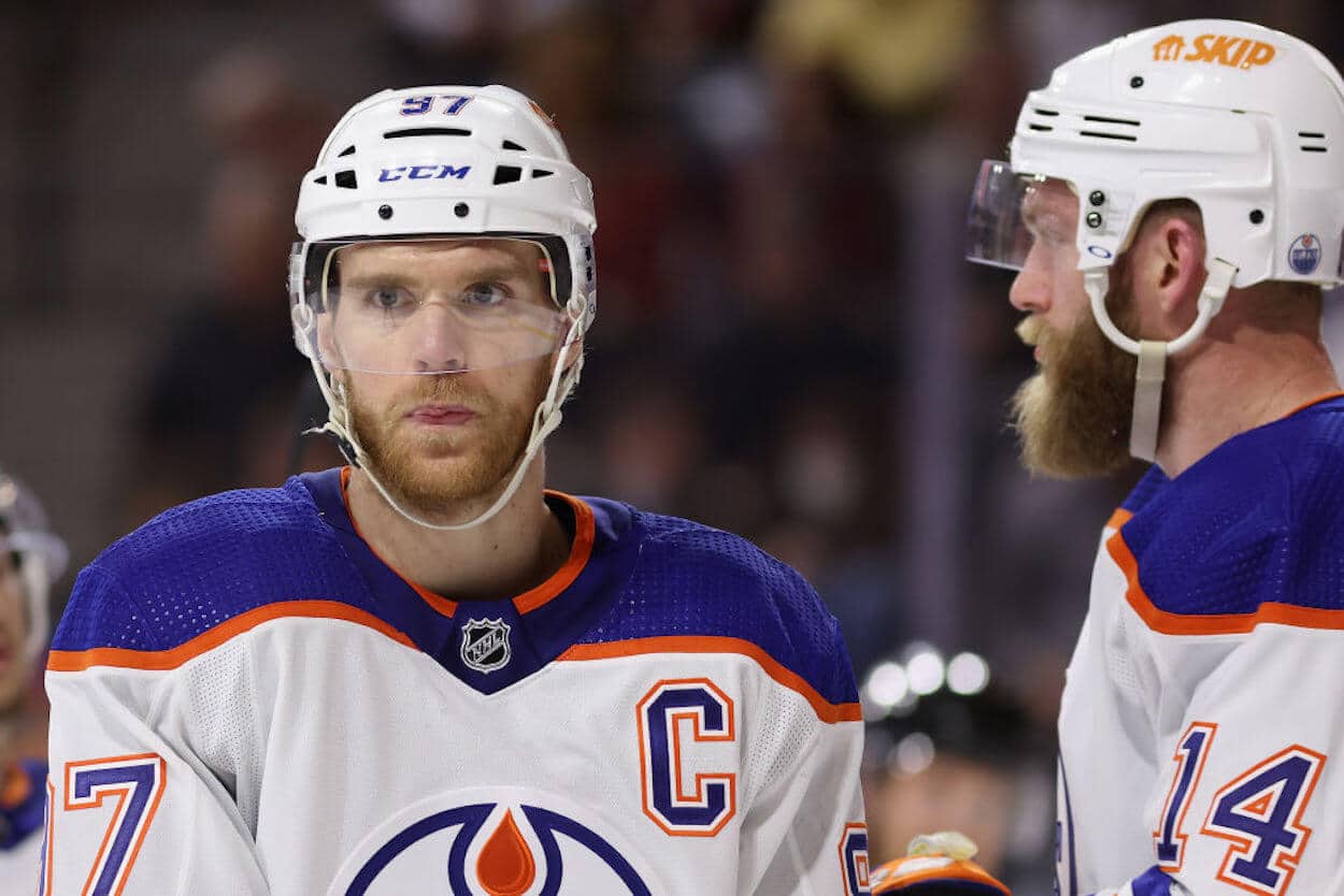 Connor McDavid (L) on the ice for the Edmonton Oilers.