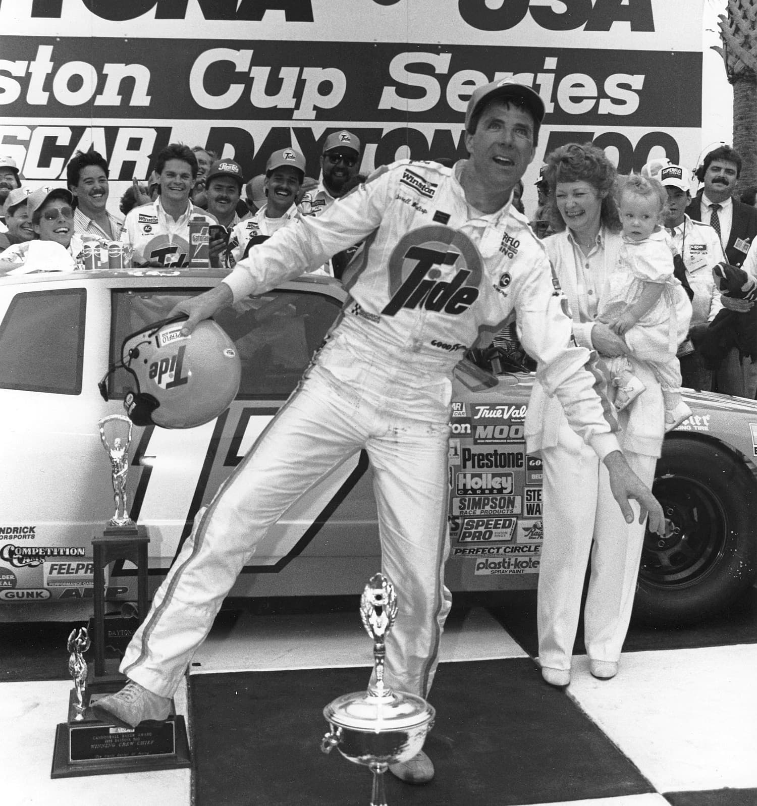 Darrell Waltrip celebrates following his Daytona 500 victory by performing the Ickey Shuffle, a dance created by NFL player Ickey Woods. | ISC Archives/CQ-Roll Call Group via Getty Images