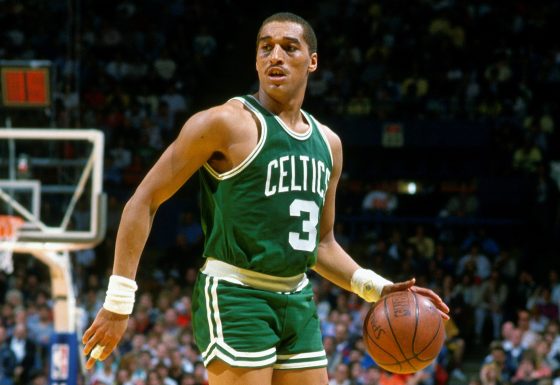 Dennis Johnson of the Boston Celtics dribbles the ball against the Milwaukee Bucks.