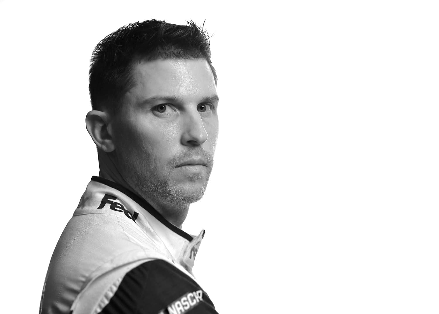 NASCAR driver Denny Hamlin poses for a photo during NASCAR Production Days at Charlotte Convention Center on Jan. 18, 2023 in Charlotte, North Carolina. | Jared C. Tilton/Getty Images)