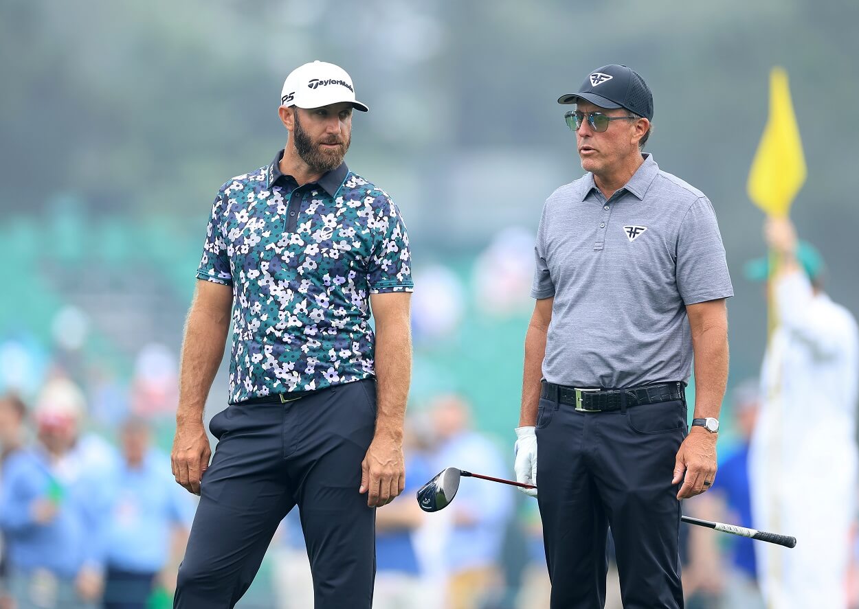 LIV Golf players Dustin Johnson and Phil Mickelson during a practice round ahead of the 2023 Masters