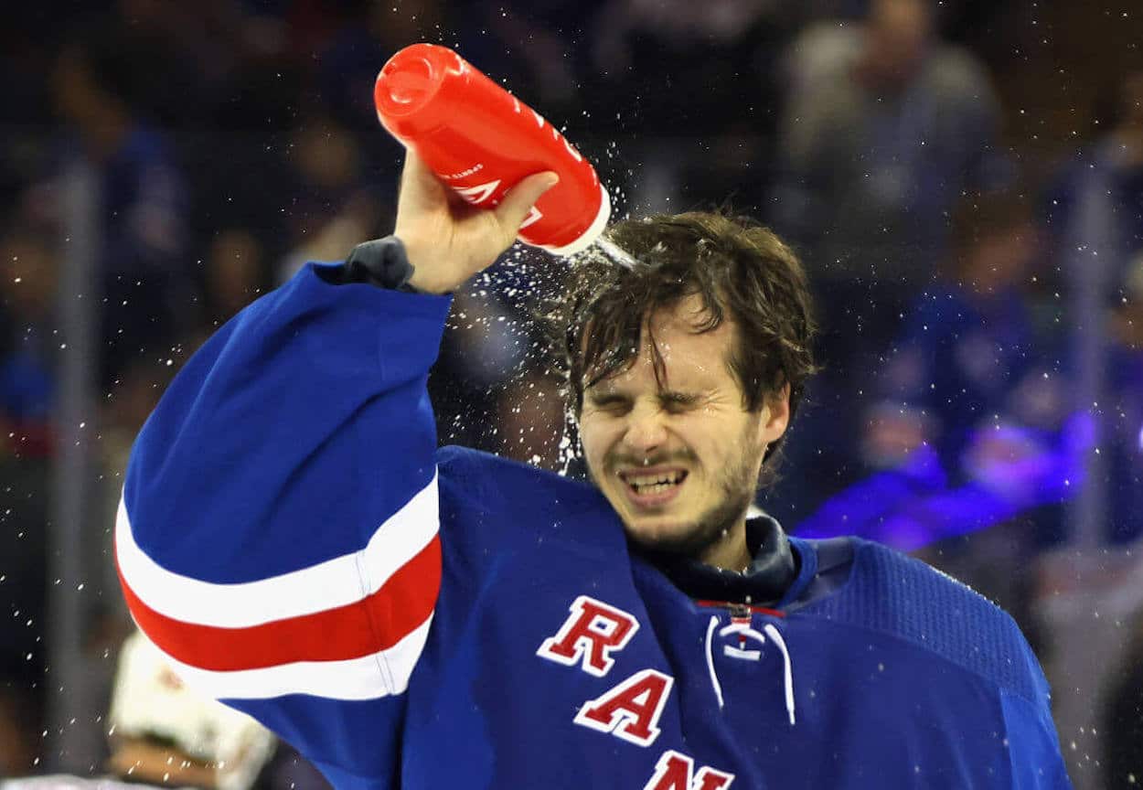 Igor Shesterkin takes a water break during the Rangers-Devils series