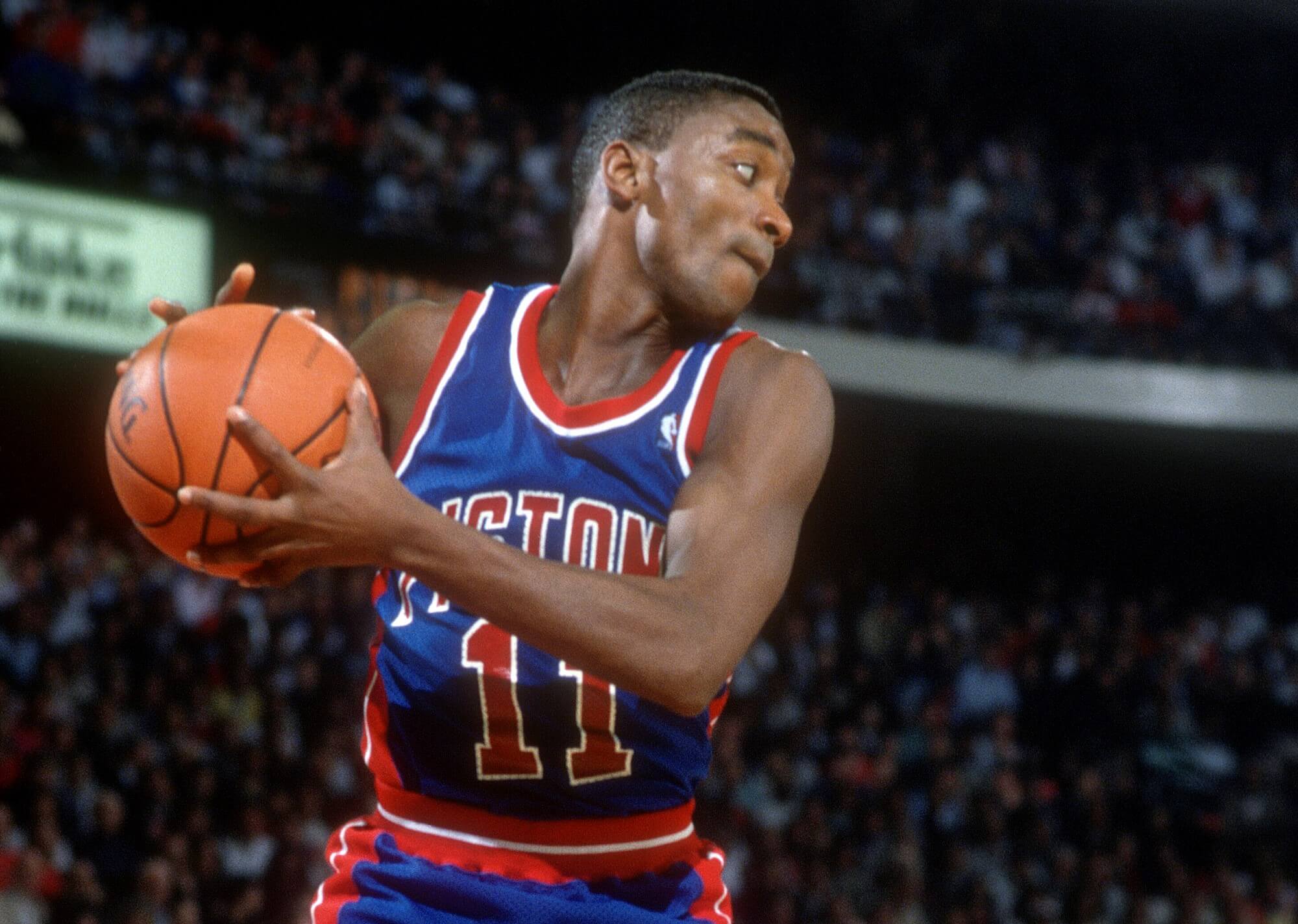 Isiah Thomas of the Detroit Pistons grabs a rebound against the Chicago Bulls.