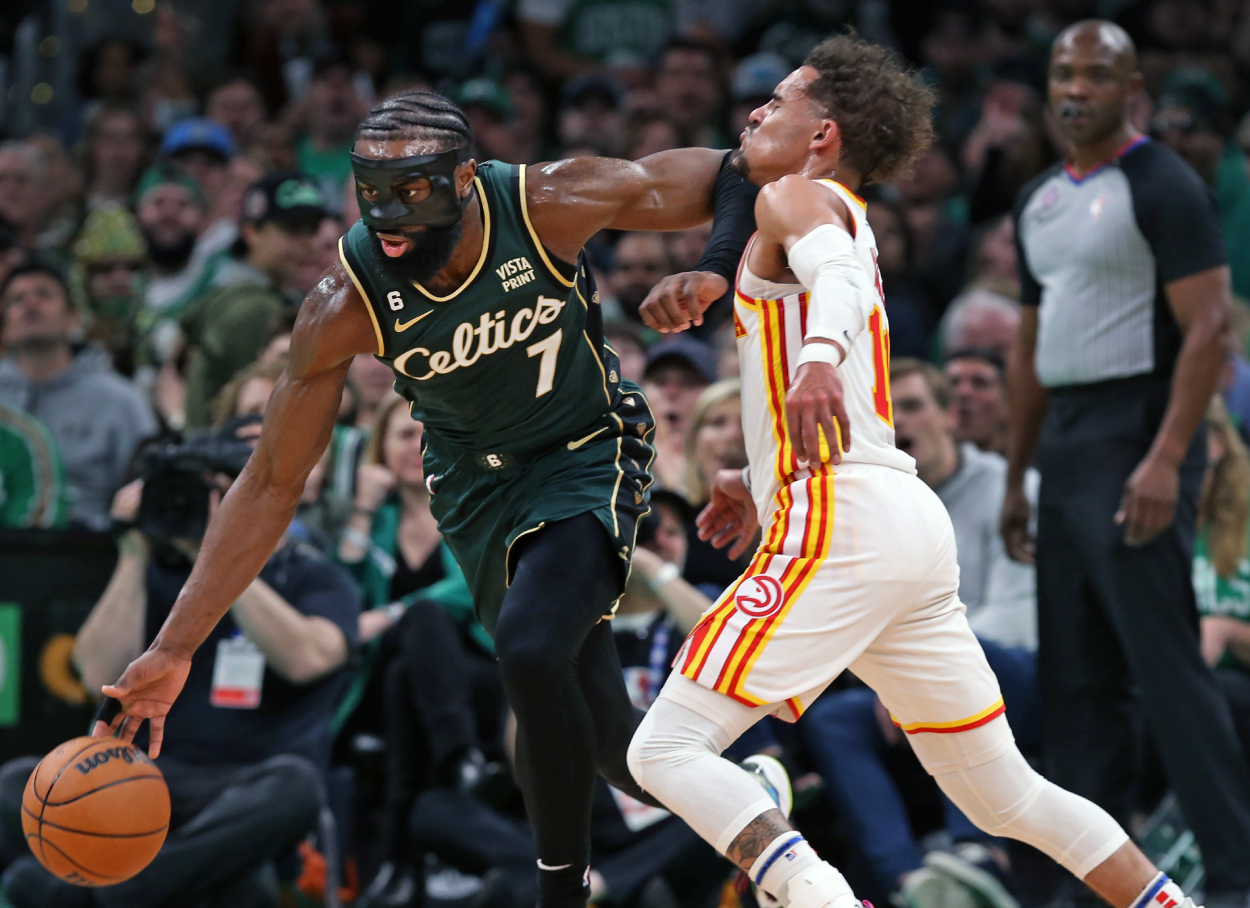 Boston Celtics guard Jaylen Brown elbows Atlanta Hawks star Trae Young square on the chin.