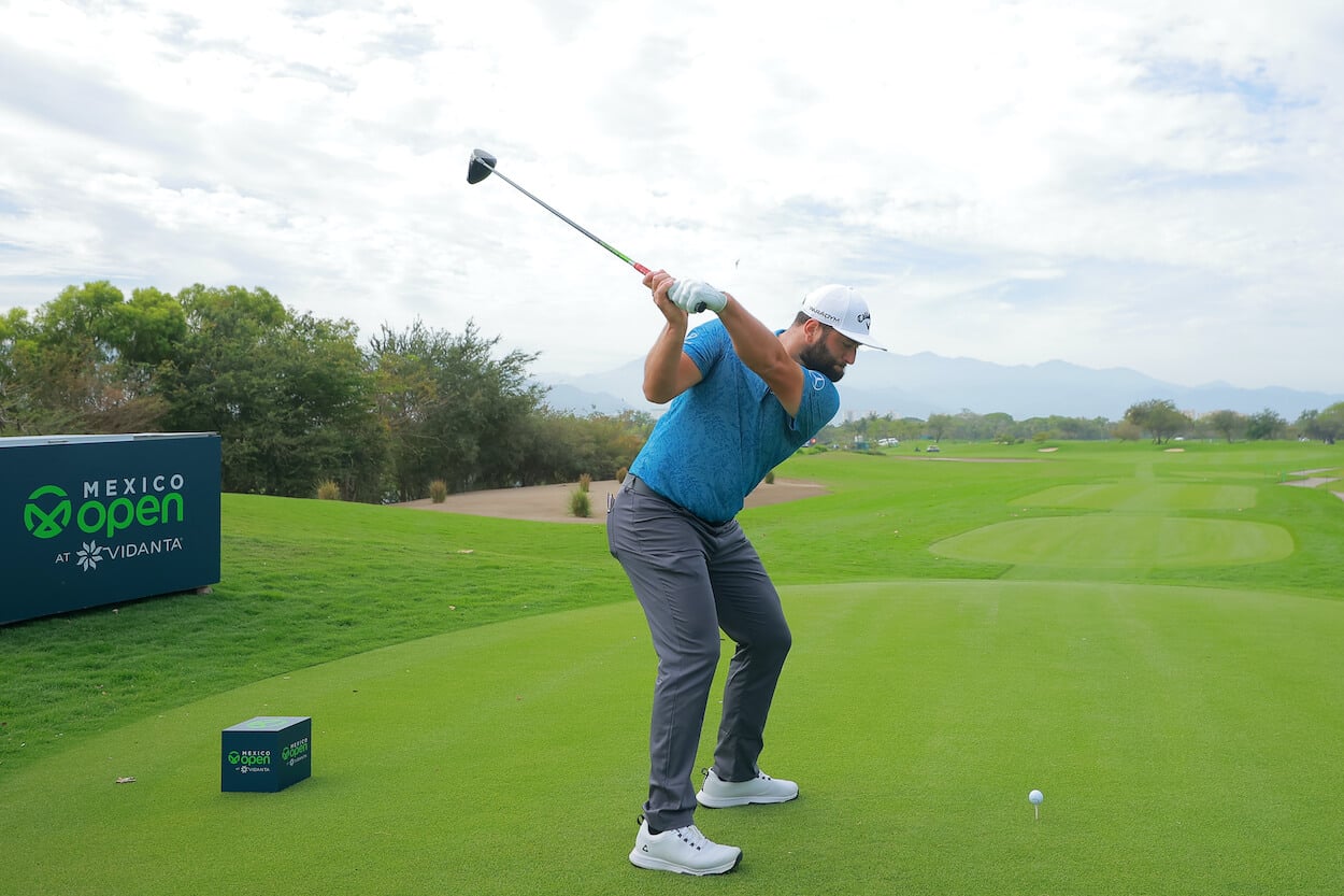 Jon Rahm hits a tee shot prior to the 2023 Mexico Open.