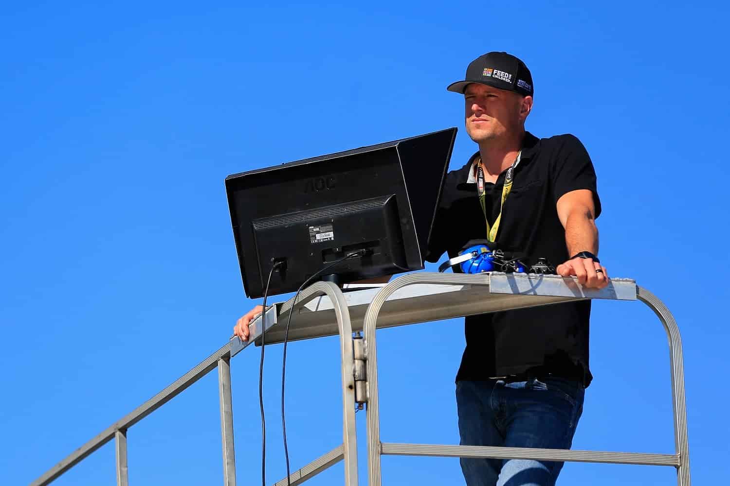 Josh Wise looks on from the top of a team hauler during practice for the Goody's Fast Relief 500 at Martinsville Speedway on Oct. 29, 2016. | Daniel Shirey/Getty Images