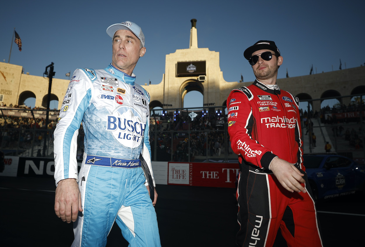 Kevin Harvick and Chase Briscoe walk together.