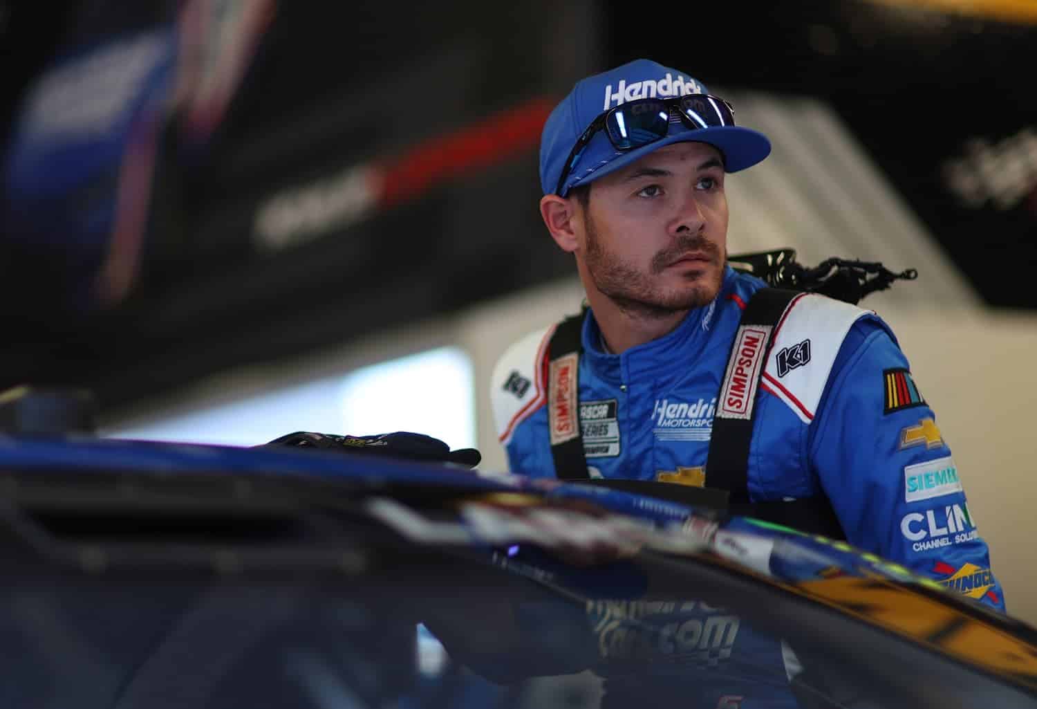 Kyle Larson looks on in the garage during practice for the Daytona 500 on Feb. 17, 2023.