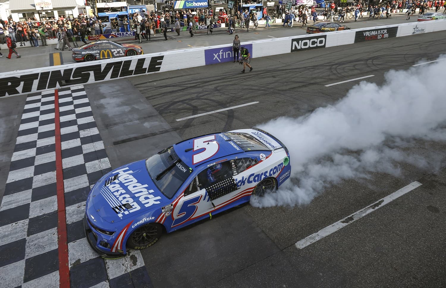 Kyle Larson celebrates with a burnout after winning the NASCAR Cup Series NOCO 400 at Martinsville Speedway on April 16, 2023.