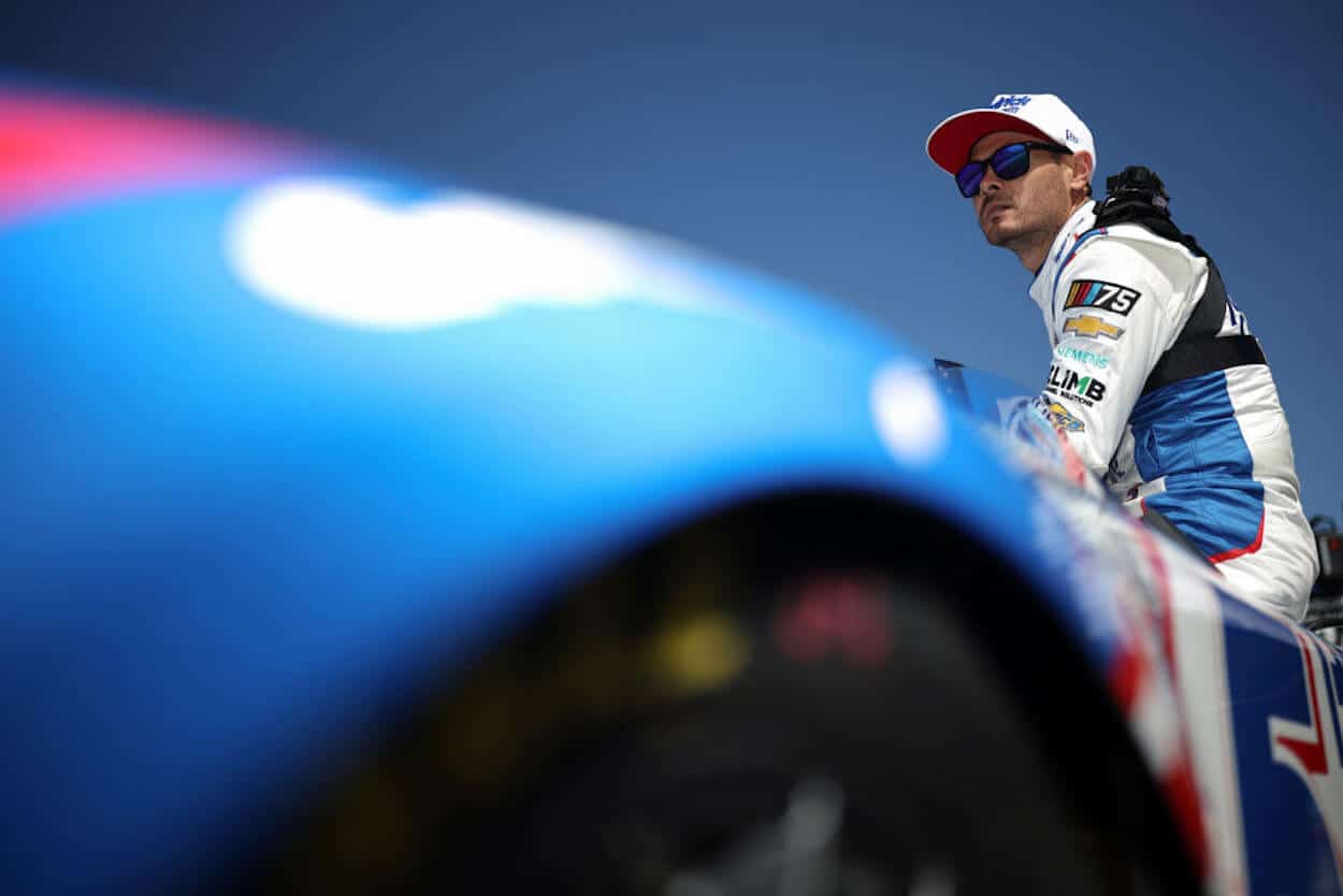 Kyle Larson looks on at Talladega Superspeedway.