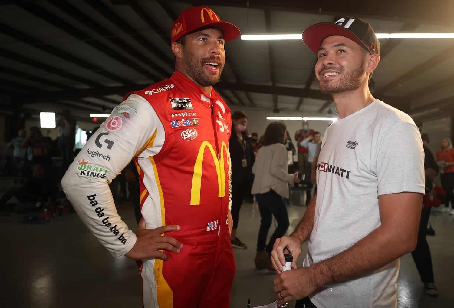 Bubba Wallace talks with Kyle Larson n Victory Lane after winning the rain-shortened NASCAR Cup Series YellaWood 500 at Talladega Superspeedway on Oct. 4, 2021.