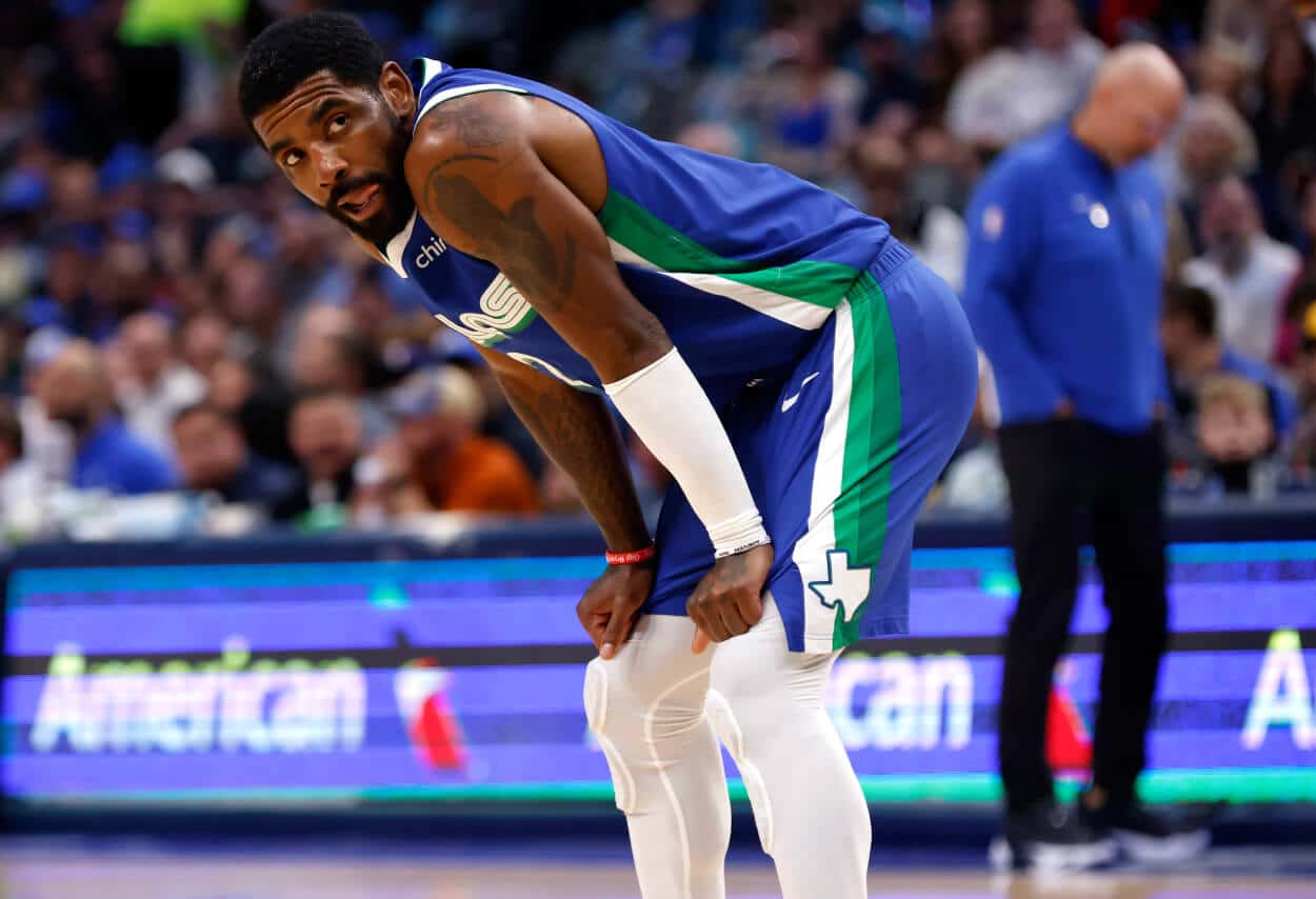 Kyrie Irving of the Dallas Mavericks looks on.