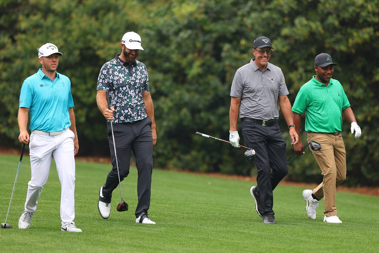 LIV Golf players Talor Gooch, Dustin Johnson, Phil Mickelson, and Harold Varner III during a practice round ahead of the 2023 Masters