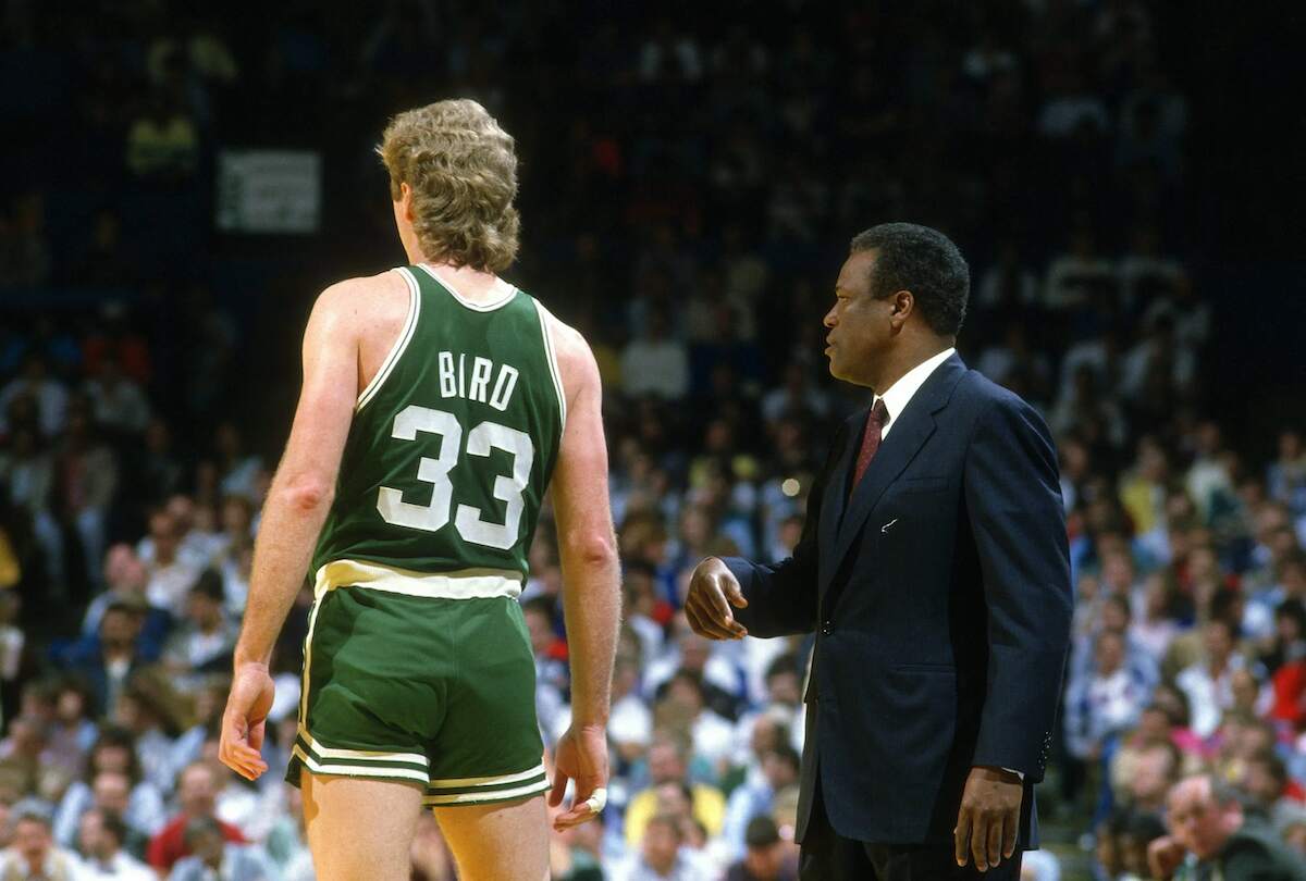 Head coach K.C. Jones of the Boston Celtics looks on with Larry Bird against the Washington Bullets in 1984.
