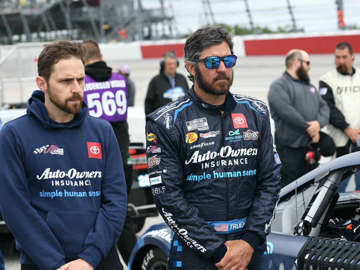 Martin Truex Jr. and crew chief James Small stand beside each other.