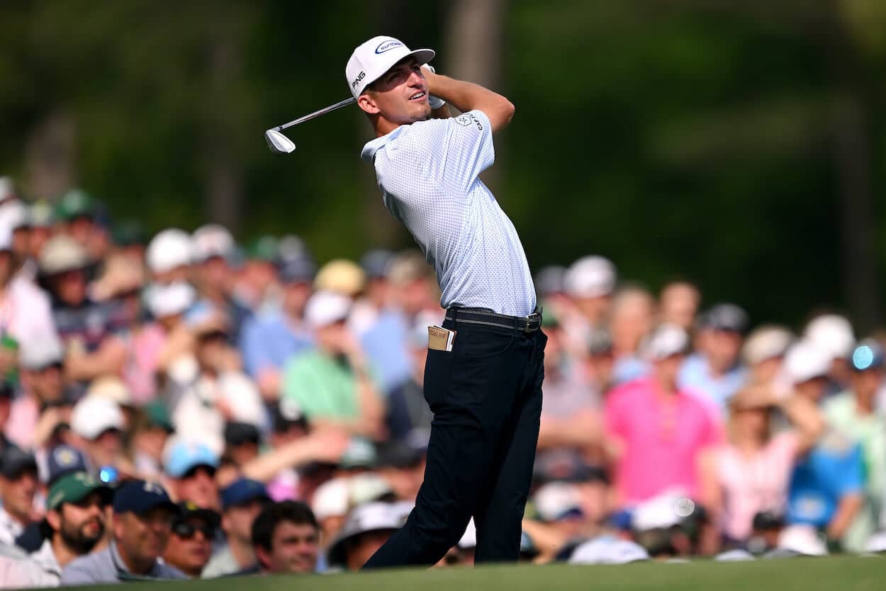 Amateur Sam Bennett plays a tee shot during the Masters.