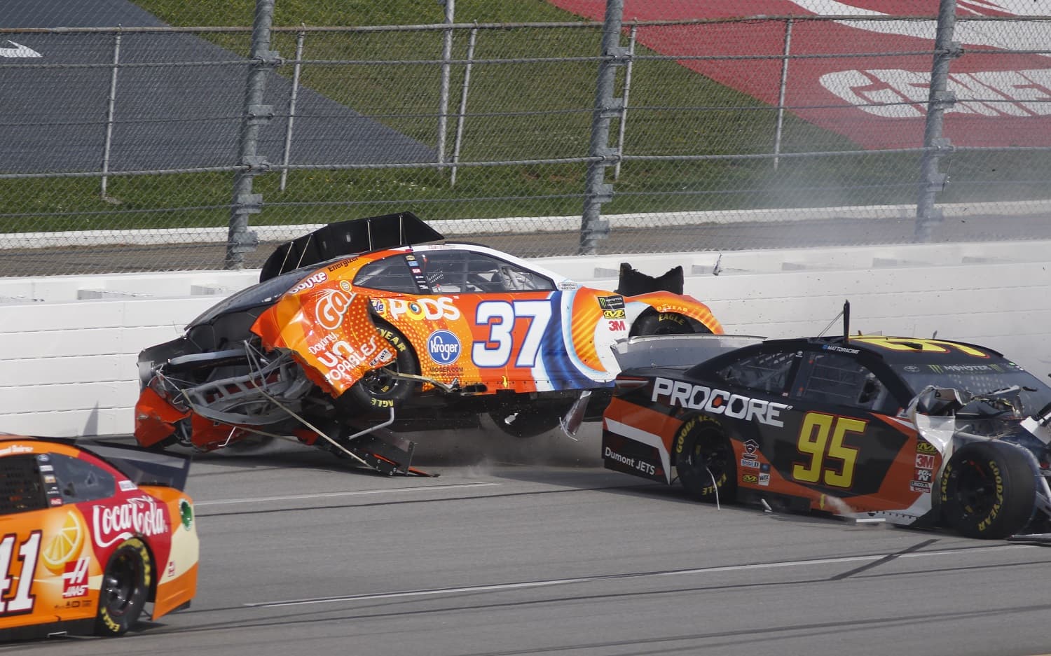 Chris Buescher (37) and Matt DiBenedetto (95) wreck during the GEICO 500 on April 28, 2019, at Talladega Superspeedway. | Jeff Robinson/Icon Sportswire via Getty Images